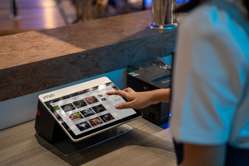 What are the essential features to look for in a WordPress booking system for local eateries?