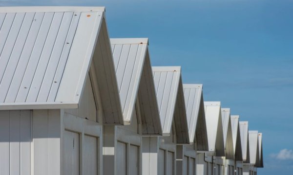 How can a WordPress vacation rental plugin reduce commission fees from third-party travel platforms?